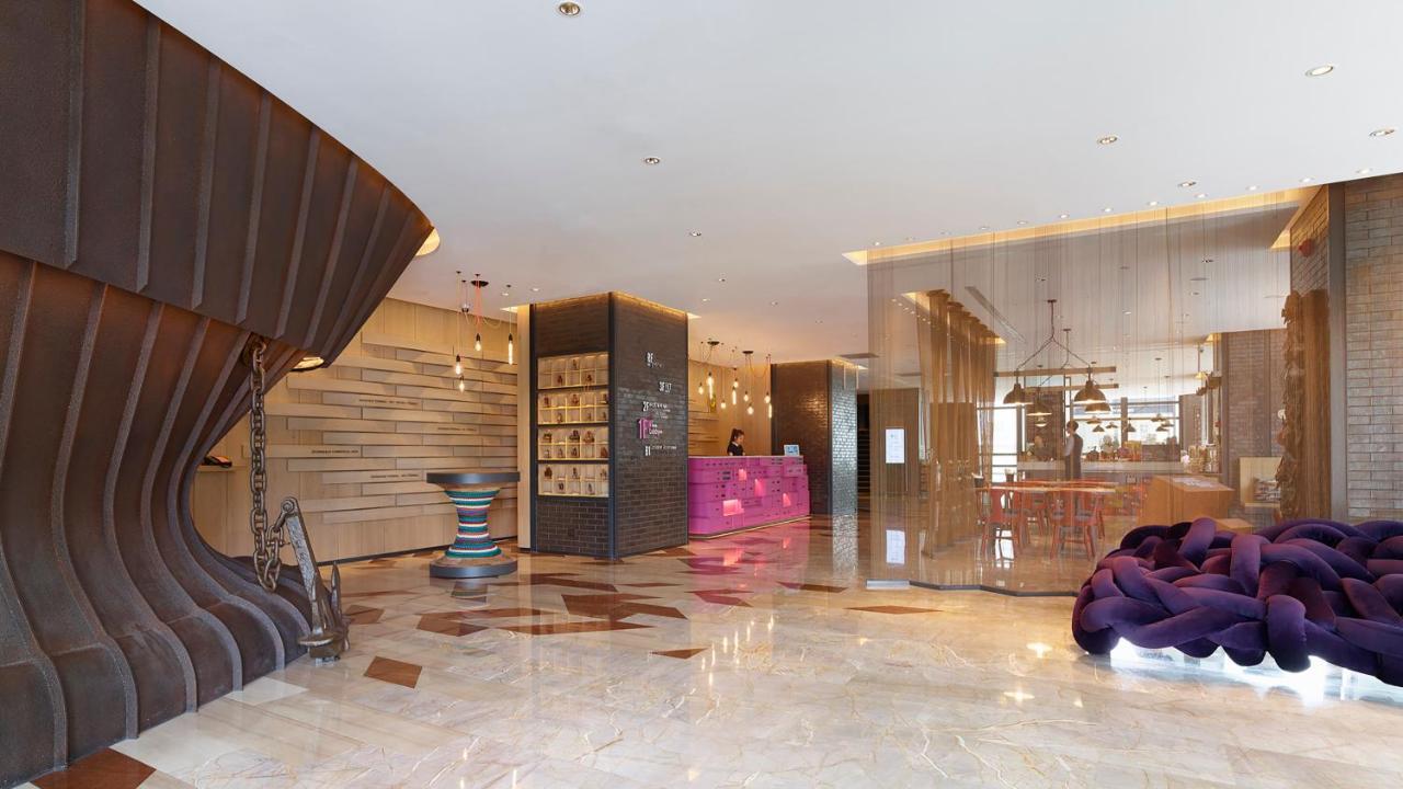 Hotel Indigo Kaohsiung Central Park By Ihg Buitenkant foto Lobby