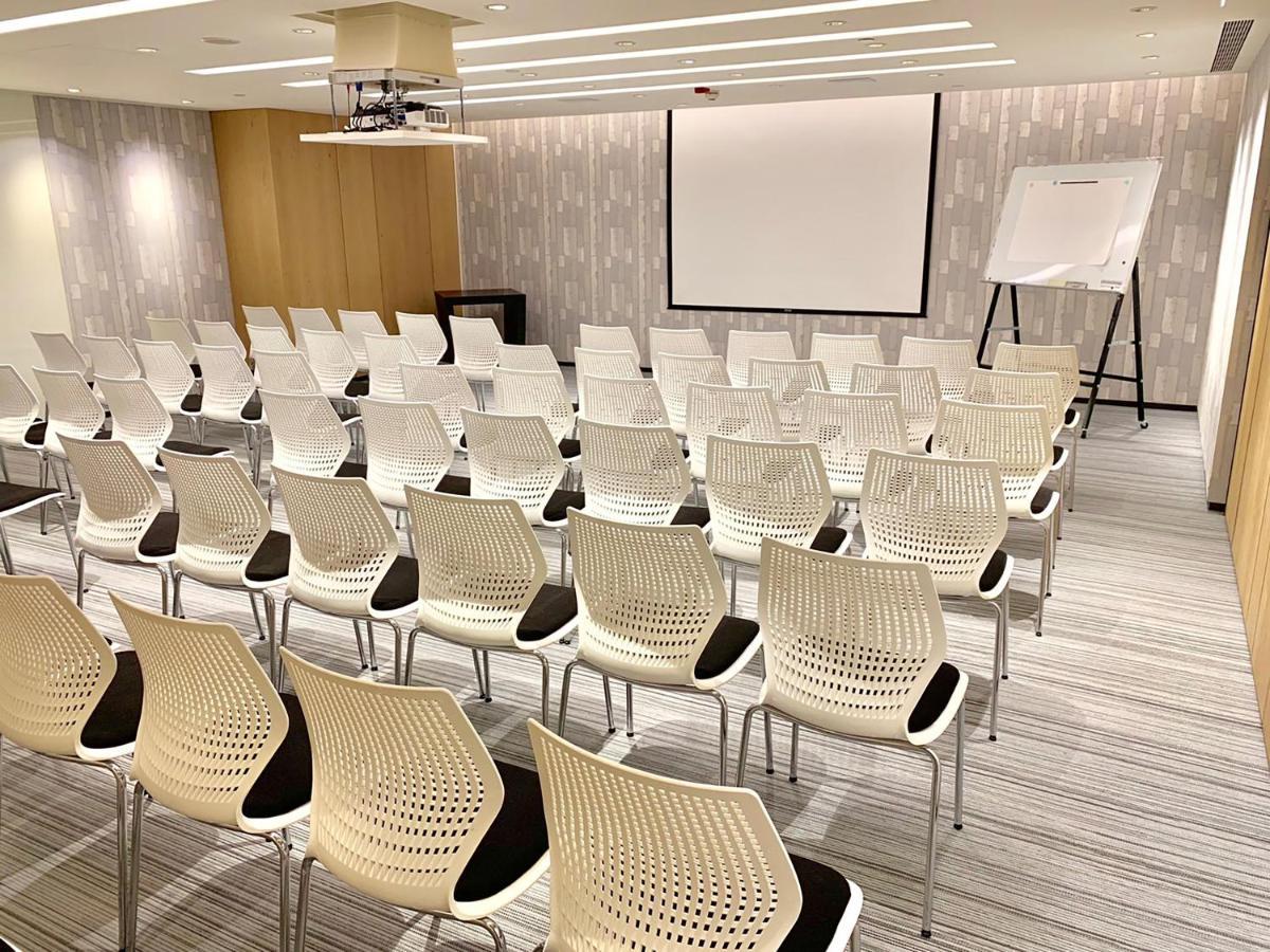 Hotel Indigo Kaohsiung Central Park By Ihg Buitenkant foto The lecture room